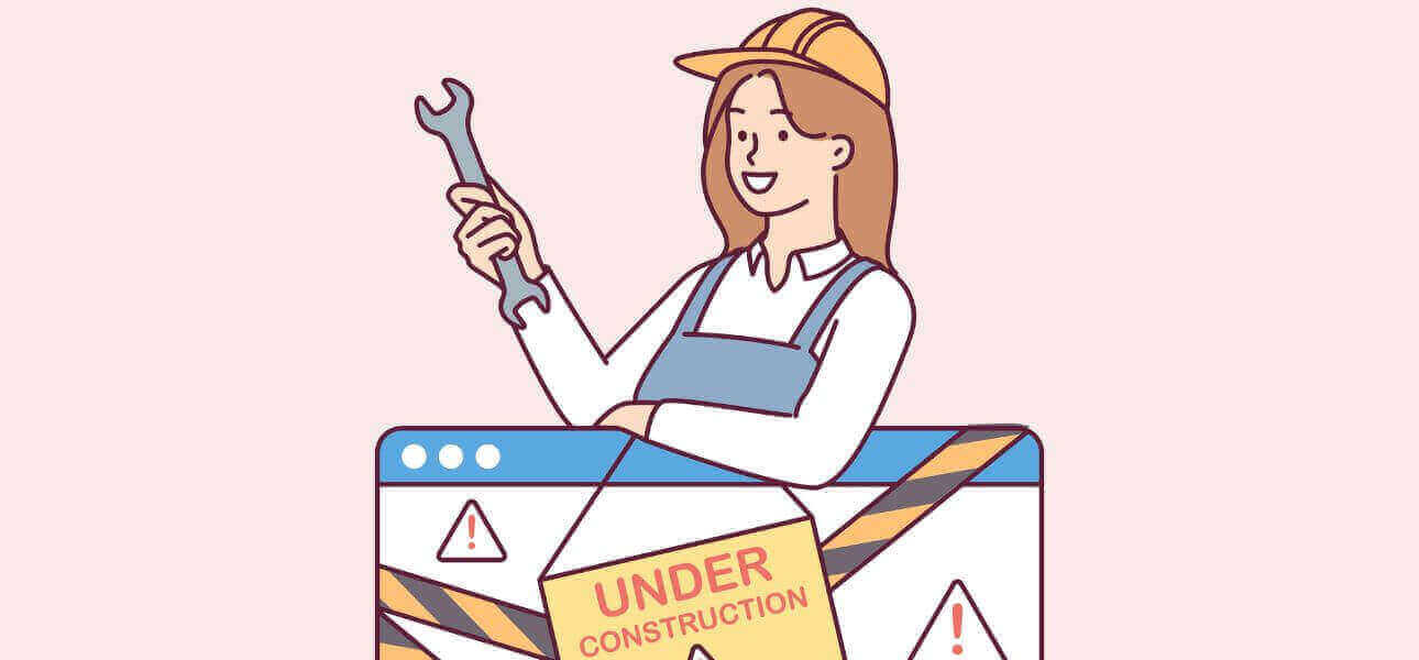 Website Construction Blog Post Image of a woman and a construction sign
